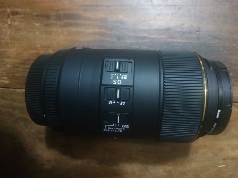 适马70mm F2.8微距镜头佳能EOS90D能用这款镜头吗？
