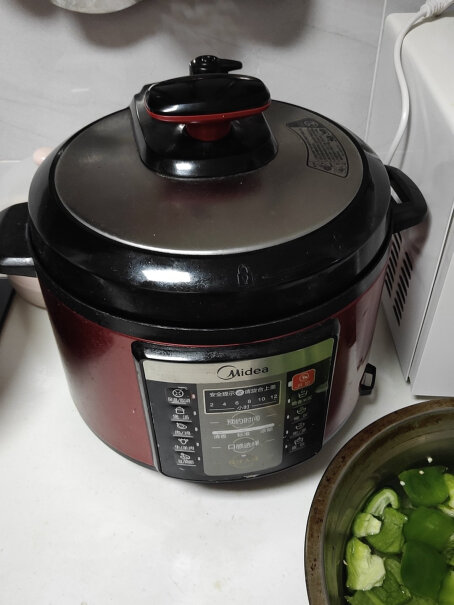 美的电压力锅家用5L双胆高压锅高压煮汤锅智能多功能电饭煲这个是5L的吗？