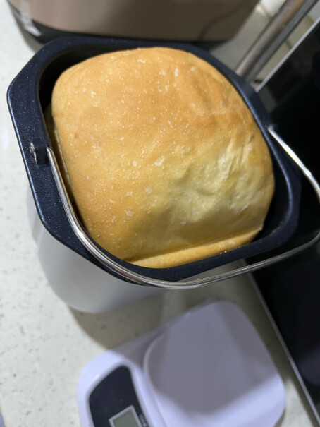 美的面包机ESC1510我的面包机刀怎么拿不下来？