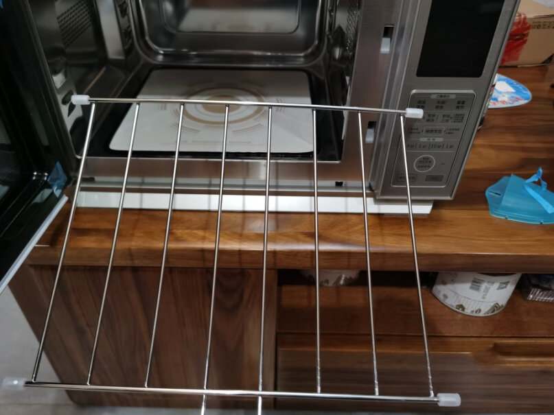 格兰仕家用平板加热快捷光波炉微烤一体机微波变频不锈钢内胆和塑料内胆有什么区别？