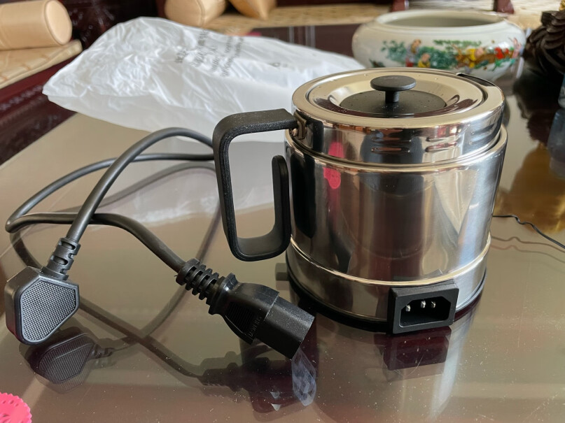 北欧欧慕电热水壶NSH05电水壶欧慕冲奶迷你便携式不锈钢请问这个水壶带自动断电功能吗？