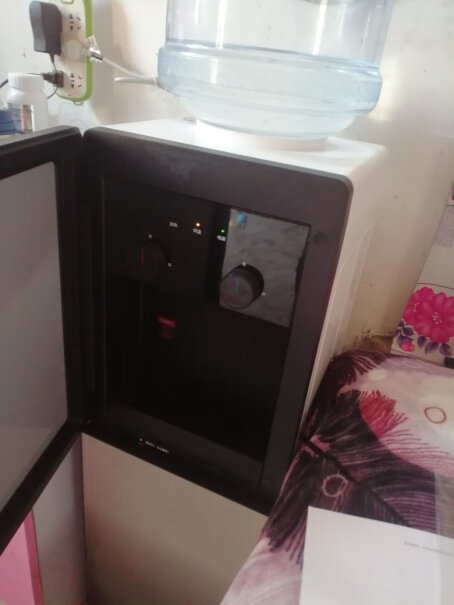美的饮水机家用办公立式柜式温热饮水器YR1102S-X水有没有塑料味？