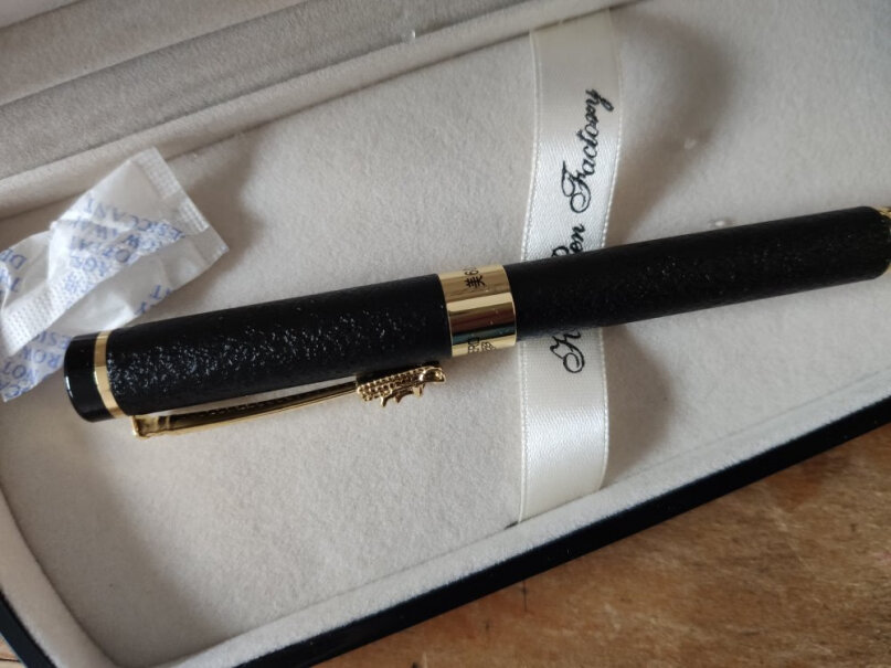 英雄钢笔黑绒砂铱金钢笔美工笔明尖6006刚收到的筆为何写不出，请问为什么？