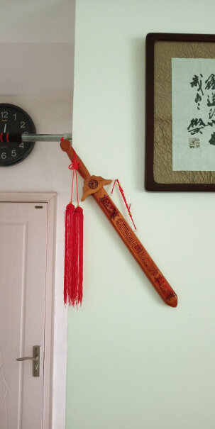 慈云阁桃木剑肥城木雕挂件家居客厅装饰摆件朱砂剑六十公分是真正的桃木吗？