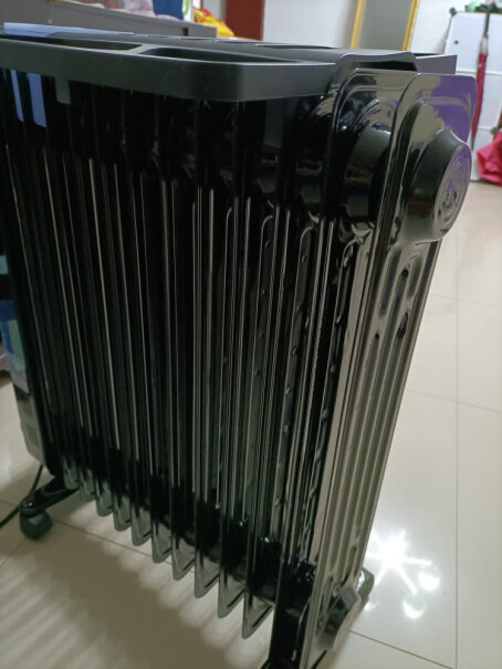 先锋Singfun取暖器电暖器电暖气片家用电热油汀13片全屋速暖低噪节能烘衣加湿DYT-Z2这个暖气片烫手吗？