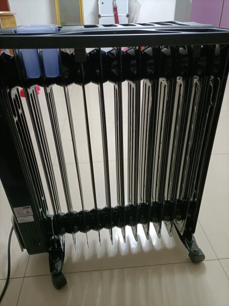 先锋Singfun取暖器电暖器电暖气片家用电热油汀13片全屋速暖低噪节能烘衣加湿DYT-Z2加热后有味道吗？