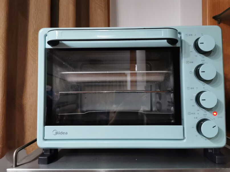 美的家用多功能电烤箱25升可以烤烧饼吗？