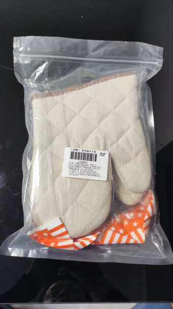 千团精工指针式烤箱温度计手套里面的布料有异味吗？