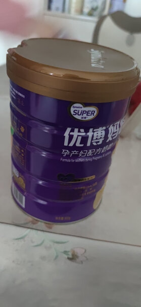 圣元优博优博孕妇妈咪奶粉0段900g罐装里面很多黑色粉状物是什么东西？