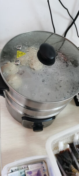 美的多用途锅电蒸锅是电磁发热还是炉盘的？