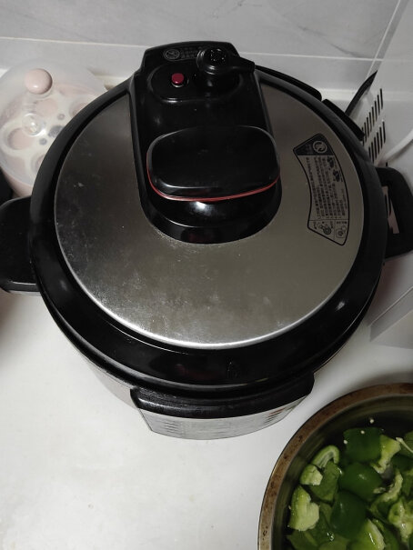 美的电压力锅家用5L双胆高压锅高压煮汤锅智能多功能电饭煲是自动排气还是手动排气的呢？
