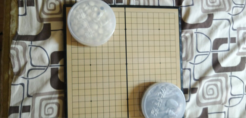 先行者磁性折叠围棋套装F-9特大号围棋棋盘棋盘是什么材料的？