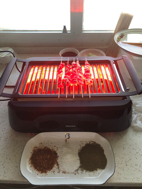 飞利浦家用少烟电烤炉烧烤炉电烤盘烤肉铁板烧商用家用牛排机烤架的涂层，高温加热有毒吧？