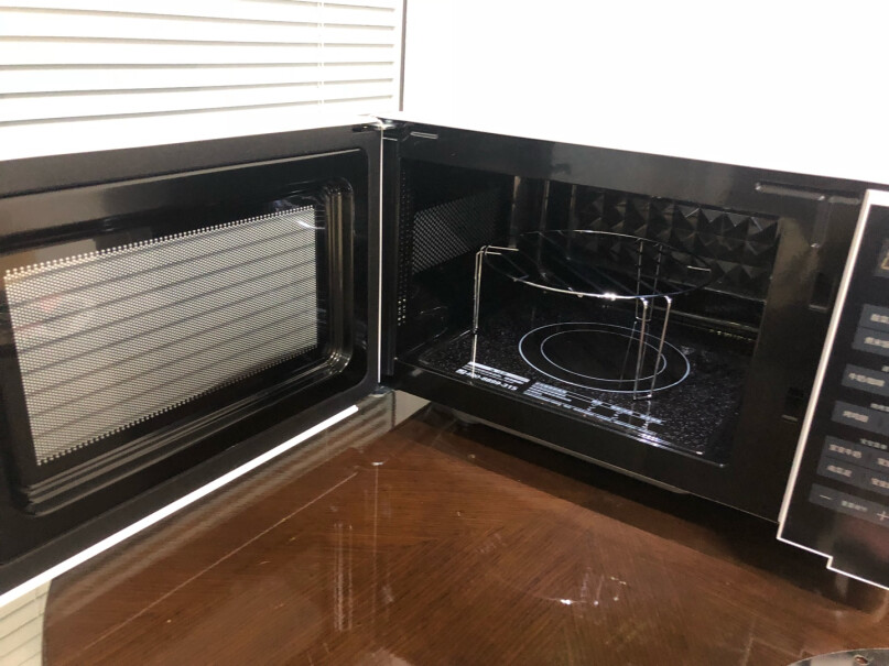 美的微烤一体机20升平板加热家用光波炉多功能微蒸烤箱食物放塑料袋子里可以直接热么？
