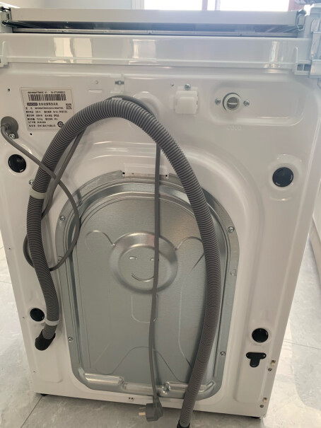 三星9公斤热泵烘干机家用干衣机低温护衣手扶在机箱上，感觉振动明显吗？