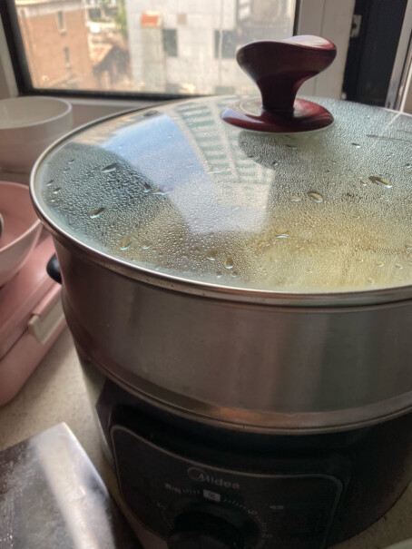 美的多用途锅电蒸锅电源线连着锅还是分开的？。。