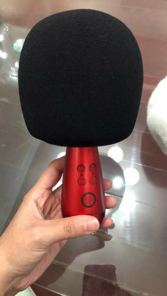 绯红色迪丽热巴同款麦克风无线蓝牙话筒音响一体麦克风连上电视后是电视出声音还是话筒出声音？