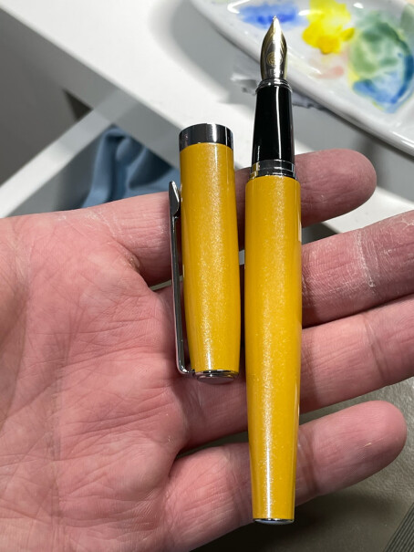 英雄钢笔382商务办公铱金钢笔签字笔能用黑色碳素墨水吗？