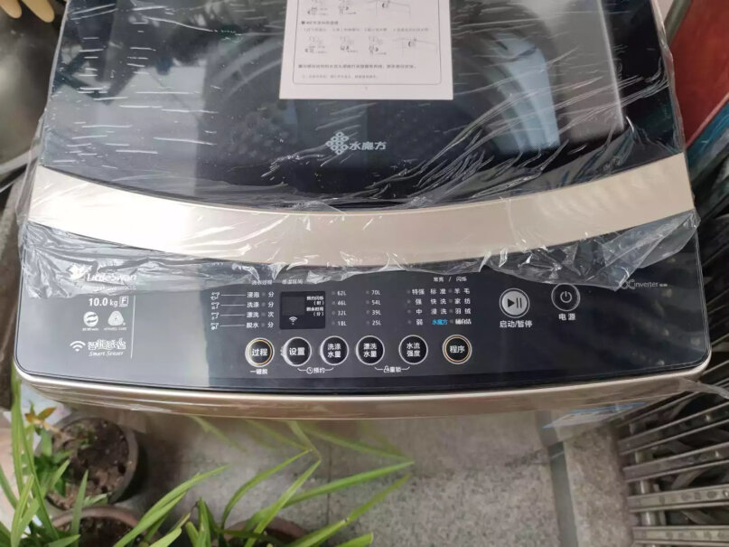 小天鹅8公斤变频波轮洗衣机全自动外壳是塑料还是不锈钢的？