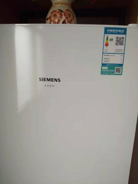 西门子SIEMENS274升请问 冰箱的中间层 怎么调温度 ，在哪儿能把温度调高一点。