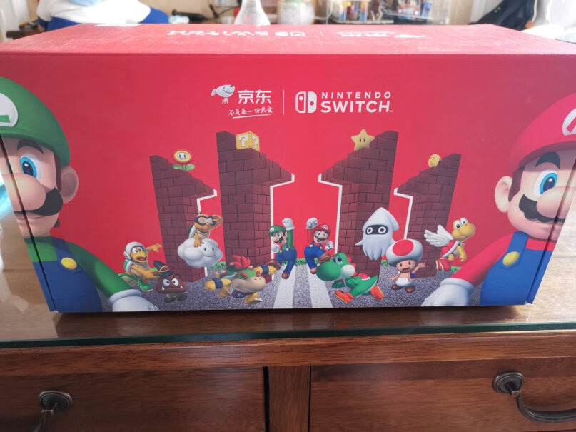 马力欧京东特别礼盒Nintendo手柄和腕带卡扣总感觉很松动，正常吗？
