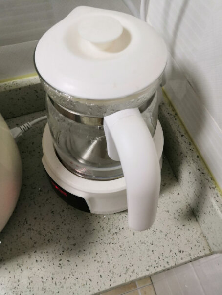 新贝恒温水壶婴儿恒温调奶器有没有温度调到50度感觉还是温的呢？