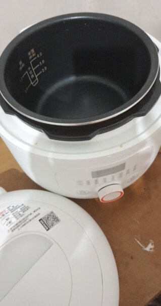 九阳迷你电压力锅家用电高压锅压力煲锅盖跟锅是连体的吗？不然没地方放锅盖？