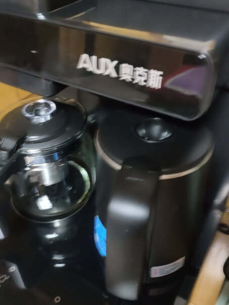 奥克斯茶吧机家用多功能智能遥控温热型立式饮水机高端轻奢款与莫兰迪灰款有什么区别啊？