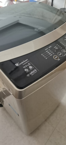 小天鹅8公斤变频波轮洗衣机全自动洗衣机里边白色的板是干嘛用的？