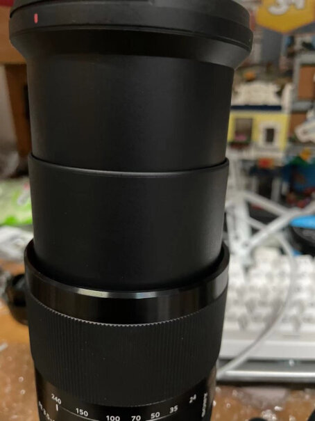 SONY SELP28135G我有F4 24-70mm镜头，是买24-240mm还是70-300mm比较好呢？