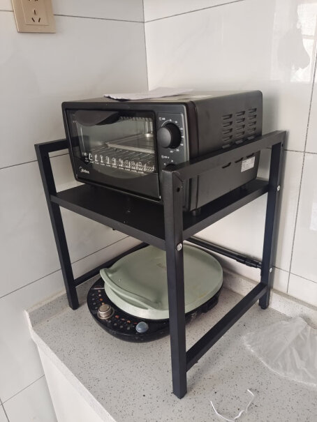 锦绣百年厨房置物架可伸缩架上面一层可以放烤箱吗？