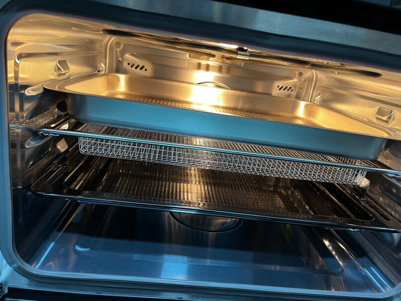 烤箱一体机蒸箱嵌入式三合一家用多功能老板好清理吗？蒸的功能用的多会不会味道很大？