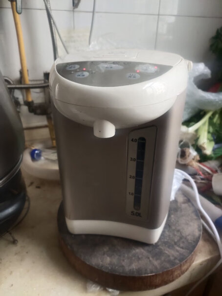 苏泊尔即热式饮水机便携迷你小型电水壶烧水壶电热水壶烧了快一周了，还是一股塑料味呢？