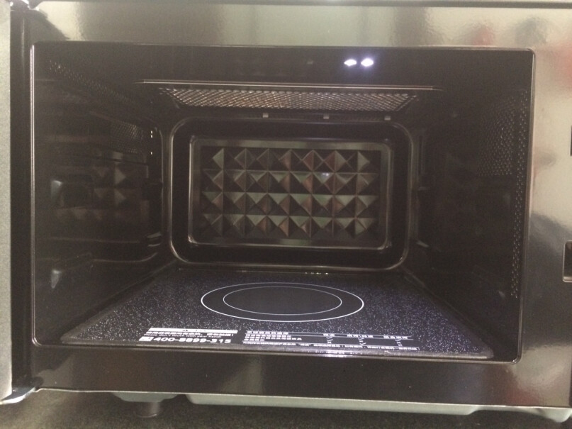 美的变频微波炉光波烧烤电烤箱一体机用什么加热？