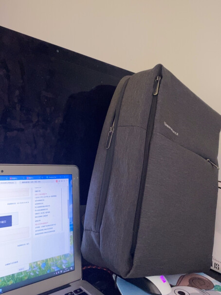 小米极简都市双肩包休闲商务笔记本电脑包15.6英寸后面的背带能拆掉吗？