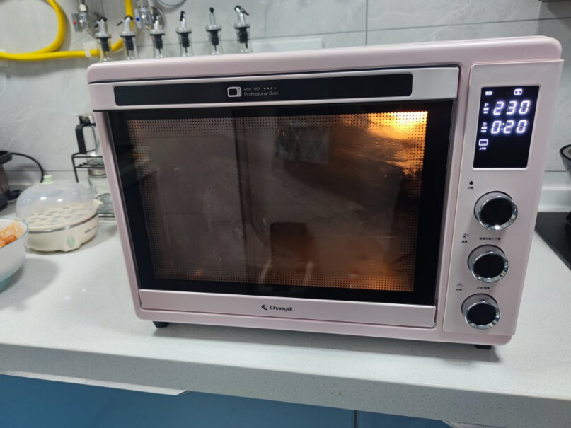 长帝家用多功能电烤箱42升大容量能放下14寸蛋糕胚吗？