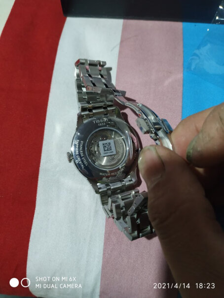 天梭TISSOT瑞士手表杜鲁尔系列皮带机械男士经典复古手表我就想问一下 这是正品吗？
