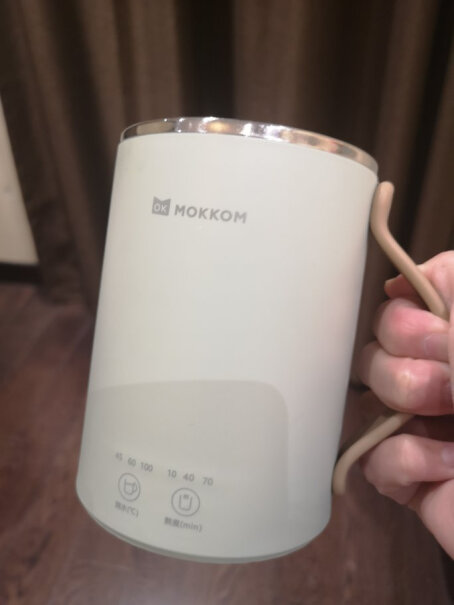 mokkom磨客迷你养生杯养生壶电热水杯请问煮花茶时水会溢出吗？