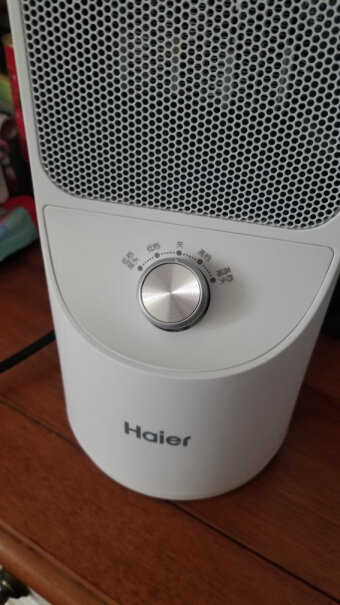 海尔Haier是把热气吹出来的吗，像空调那种？
