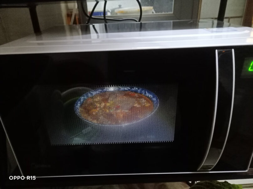 美的智能微烤一体机微波炉烤箱一体机请问，是什么材质,好清洗吗？