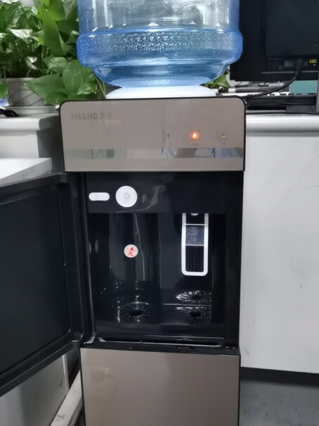 美菱饮水机家用立式办公双开门柜式温热型饮水器MY-L109这个费电吗？一天能用几度电？