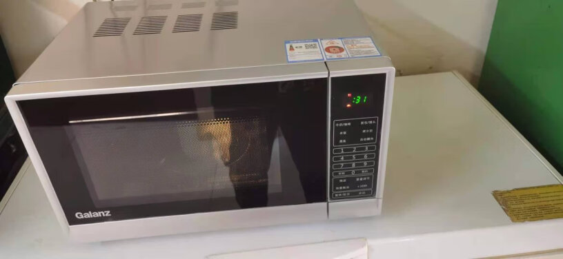 格兰仕20升家用平板加热微波炉为什么热的东西是干的？