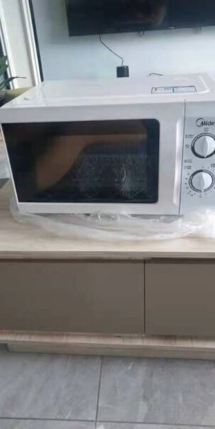 美的家用微波炉机械式微蒸一体机这个是微波炉烤箱一体机吗？