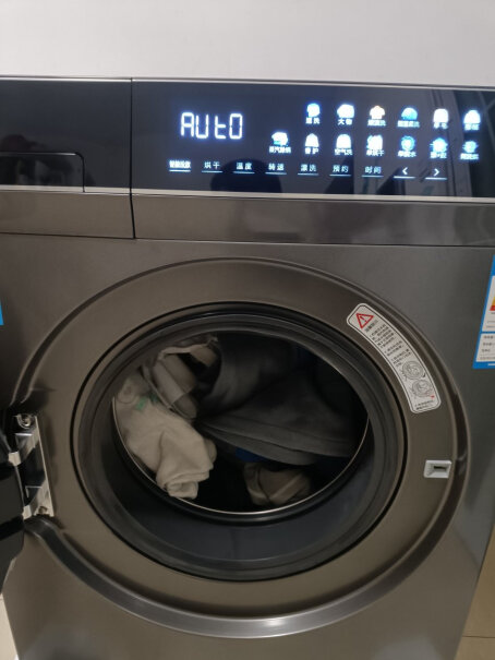 海尔滚筒洗衣机全自动10公斤洗烘一体这款能洗羽绒服吗？洗羽绒服调什么模式？