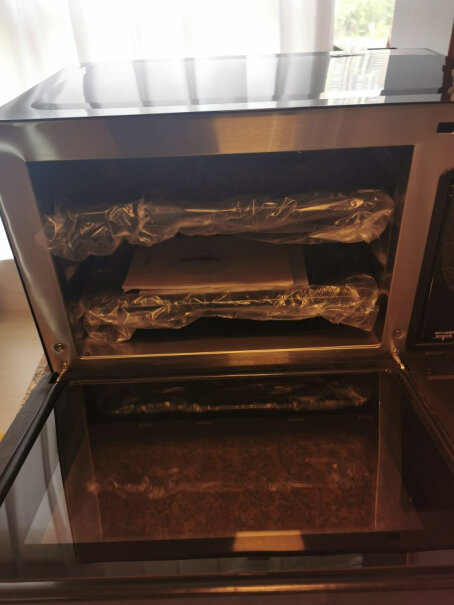 格兰仕电蒸箱蒸烤箱晒图送的披萨烤盘多大尺寸的？