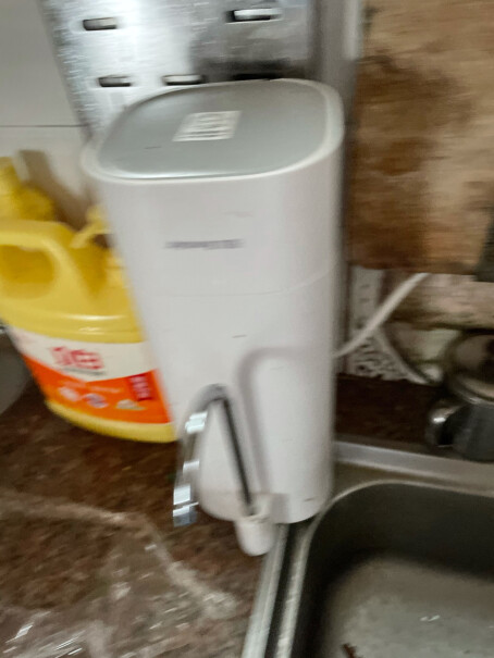 九阳净水器家用台式厨房自来水龙头净化活性炭自来水前置过滤器接这个水烧开喝还会有漂白粉的异味吗？