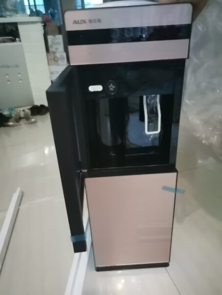 奥克斯饮水机家用立式办公双开门柜式冷热饮水器YLR-5-B这款饮水机好用吗？接出来的开水有没有异味？