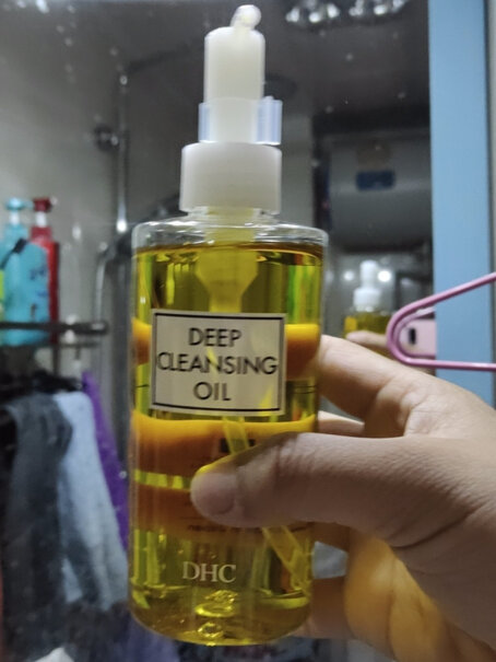 DHC橄榄卸妆油200ml这个用着怎么样 是正品吗？脸部有没有油油的？