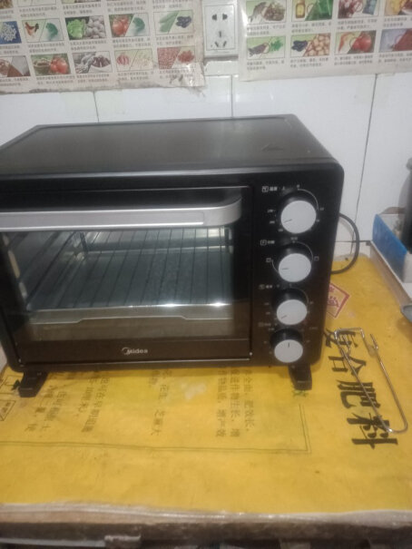 美的烤箱家用烘焙迷你小型电烤箱多功能台式蛋糕烤箱25L刚开始用，除了机械声，还会有咯噔咯噔响声是正常吗？