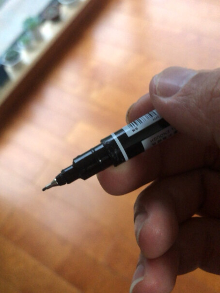 得力deli黑色双头记号笔美术绘画勾线笔12支在储奶袋上写字容易擦掉吗？（塑料袋子材质）